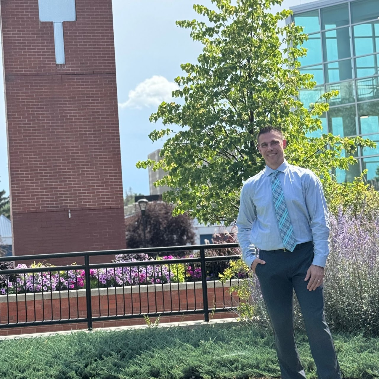 Michael Reid standing in front of Medicine Hat City Hall